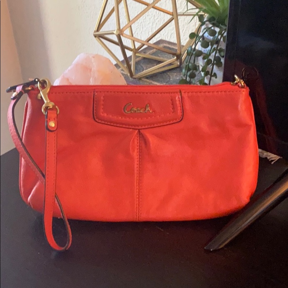 Large Tangerine Coach Wristlet